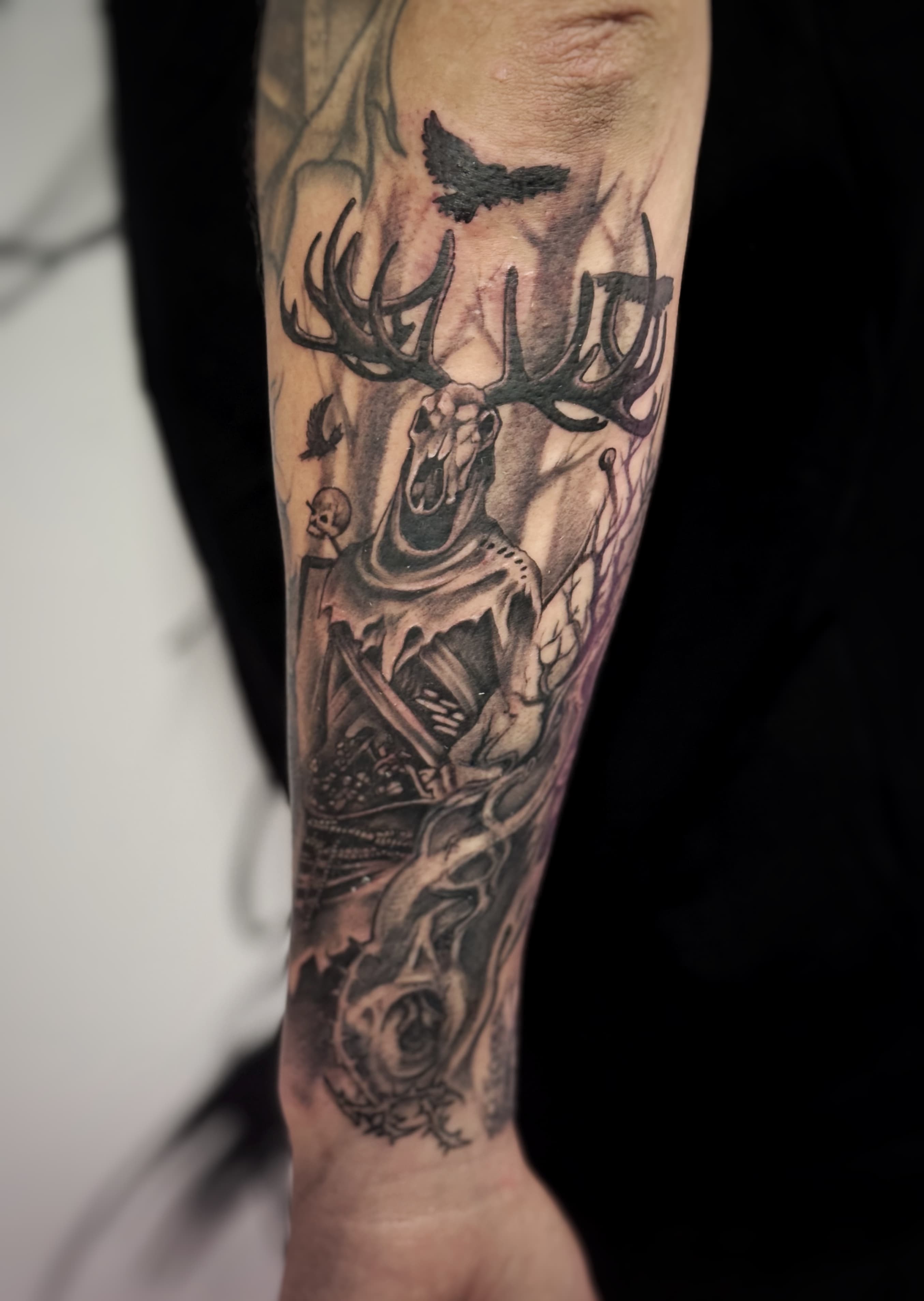 Detailed black tattoo work by Mariana