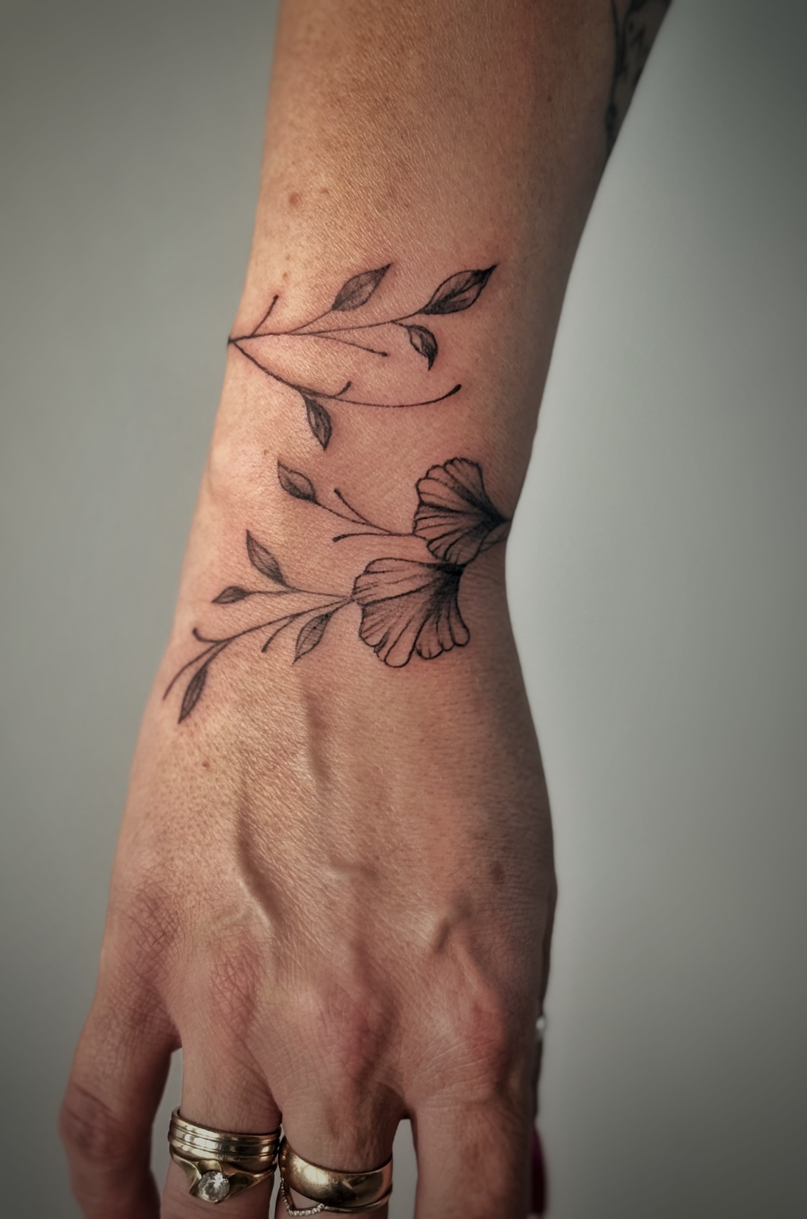 Black ink realistic tattoo by Mariana at Black Stroke